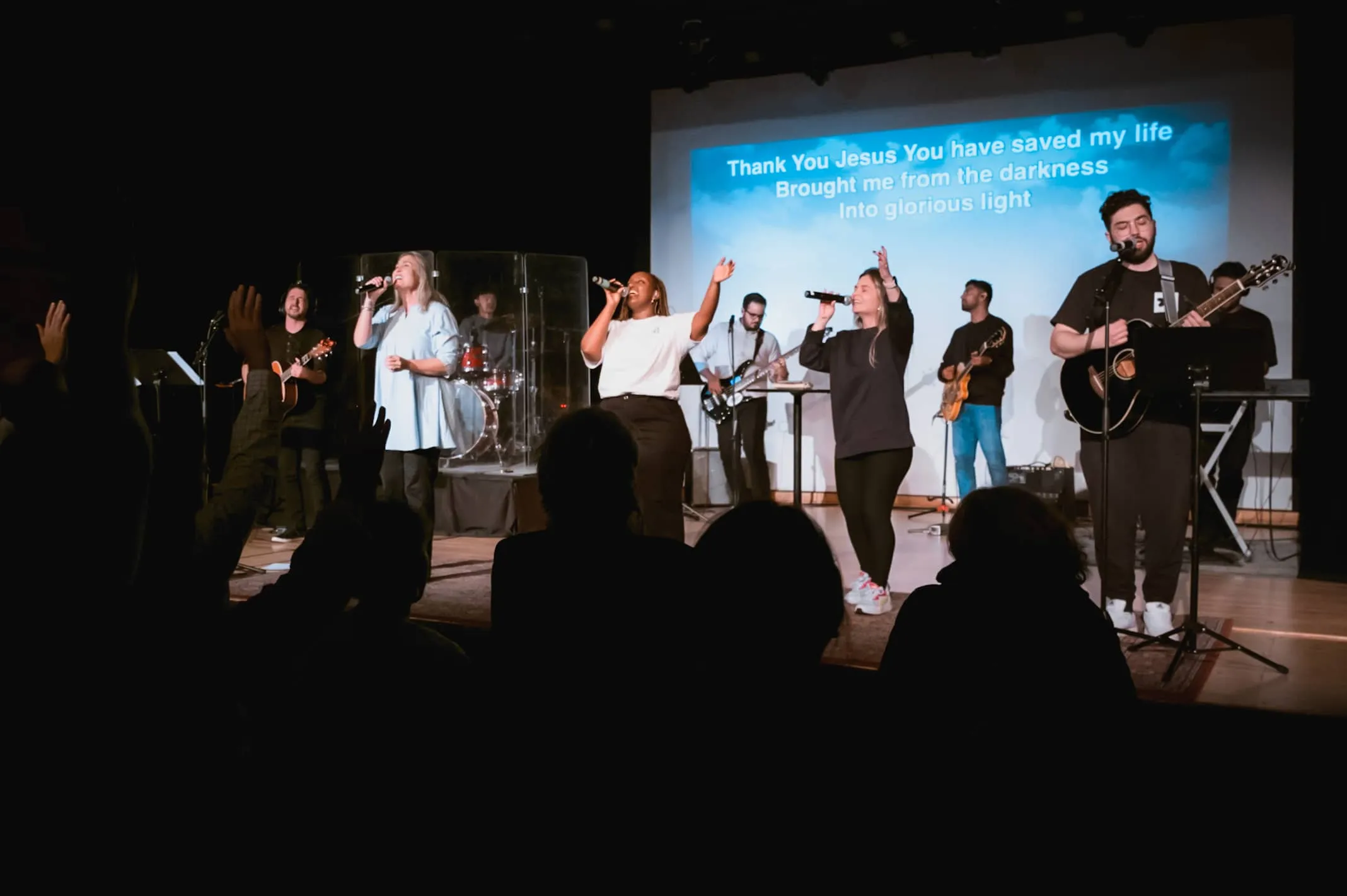 The congregation worshipping in the College Notre-Dame theatre
